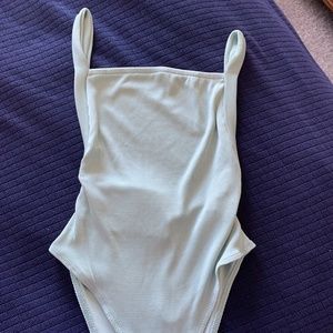 Light blue body suit